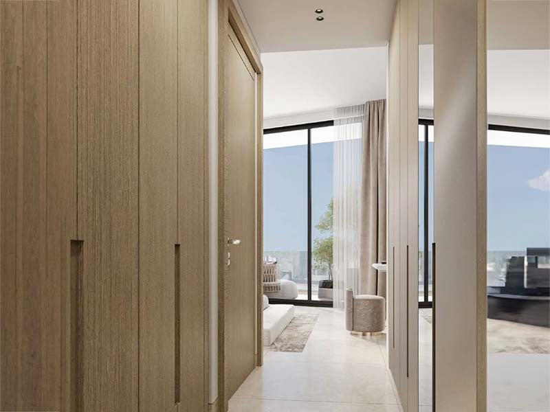 Azura Residences at Dubai Islands stands as a testament to coastal living. The towers rise from the shore, their clean lines and glass surfaces catching the light of sea and sky. Inside, homes range from one to three bedrooms. Each space is thoughtfully designed, with open layouts that make the most of natural light and views. Kitchens flow into living areas, creating spaces for both daily life and entertaining. Bedrooms offer a calm retreat, while bathrooms blend style with function. Life at Azura extends beyond private spaces. A pool invites residents to cool off and unwind. The fitness center caters to those who want to stay active. Children have their own area to play and explore. For social gatherings, a barbecue area sets the stage for shared meals and conversations. Step outside, and Dubai Islands unfolds. Beaches stretch along the coast, perfect for morning walks or evening strolls. Parks dot the landscape, offering green spaces for relaxation. Waterways weave through the islands, creating a unique blend of land and sea. The city's energy remains close, yet the immediate surroundings offer a sense of escape. Starting at AED 1.5M, Azura Residences at Dubai Islands offers 1 to 3-bedroom apartments. The handover is expected in Q2 2026 with a 60/40 payment plan.