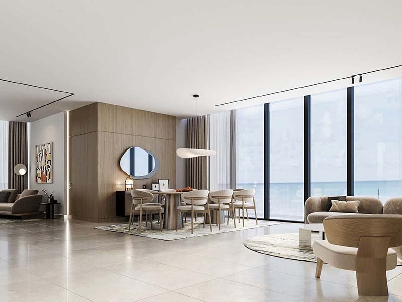 Azura Residences at Dubai Islands stands as a testament to coastal living. The towers rise from the shore, their clean lines and glass surfaces catching the light of sea and sky. Inside, homes range from one to three bedrooms. Each space is thoughtfully designed, with open layouts that make the most of natural light and views. Kitchens flow into living areas, creating spaces for both daily life and entertaining. Bedrooms offer a calm retreat, while bathrooms blend style with function. Life at Azura extends beyond private spaces. A pool invites residents to cool off and unwind. The fitness center caters to those who want to stay active. Children have their own area to play and explore. For social gatherings, a barbecue area sets the stage for shared meals and conversations. Step outside, and Dubai Islands unfolds. Beaches stretch along the coast, perfect for morning walks or evening strolls. Parks dot the landscape, offering green spaces for relaxation. Waterways weave through the islands, creating a unique blend of land and sea. The city's energy remains close, yet the immediate surroundings offer a sense of escape. Starting at AED 1.5M, Azura Residences at Dubai Islands offers 1 to 3-bedroom apartments. The handover is expected in Q2 2026 with a 60/40 payment plan.