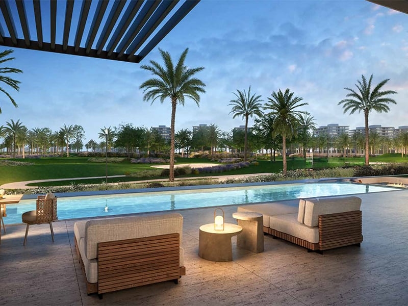 Utopia by DAMAC is an exclusive sanctuary within the tranquil surroundings of DAMAC Hills, offering a  limited selection of 5, 6 and 7-bedroom ultra-luxury villas, each meticulously designed for contemporary living. Utopia in DAMAC Hills comprises 27 contemporary villas, each with private infinity pools, basement entertainment areas, home cinemas, water features, gyms and spas. These residences provide spacious ensuite bedrooms, open kitchens and inviting family spaces, perfectly tailored for the demands of modern living. Each home is seamlessly integrated with cutting-edge smart technology, enhancing the ease of modern living.  Beyond the residences, Utopia offers an impressive array of recreational facilities, from basketball and tennis courts to cricket fields, ice rinks and horse stables. Central Park, picnic areas, kids' play zones and a jogging track complete the rich tapestry of leisure that Utopia weaves. Situated in a private enclave within DAMAC Hills, Utopia offers residents convenient access to major roadways such as Hessa Street and Emirates Road. This location ensures that the bustling city and its prominent landmarks are within easy reach, providing an unparalleled level of accessibility. Nearby, you'll find an array of conveniences, including golf courses, DAMAC Mall, supermarkets, a hotel, a fishing lake, dining options and retail outlets. Surrounded by a lush golf course and scenic landscapes, this community offers a serene living environment. Starting at AED 18.1 million, Utopia by DAMAC offers a selection of 5, 6 and 7-bedroom villas. The handover is expected in Q4 2026 with a 60/40 payment plan.